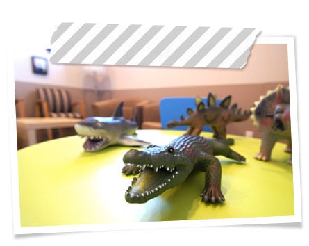 dinosaur toys on table